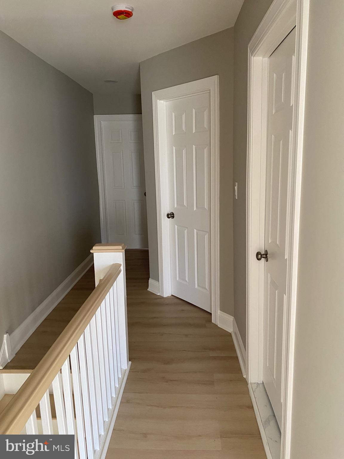 6445 Garman Street Philadelphia, PA 19142 - Photo 13 of 56 a view of a hallway with wooden floor