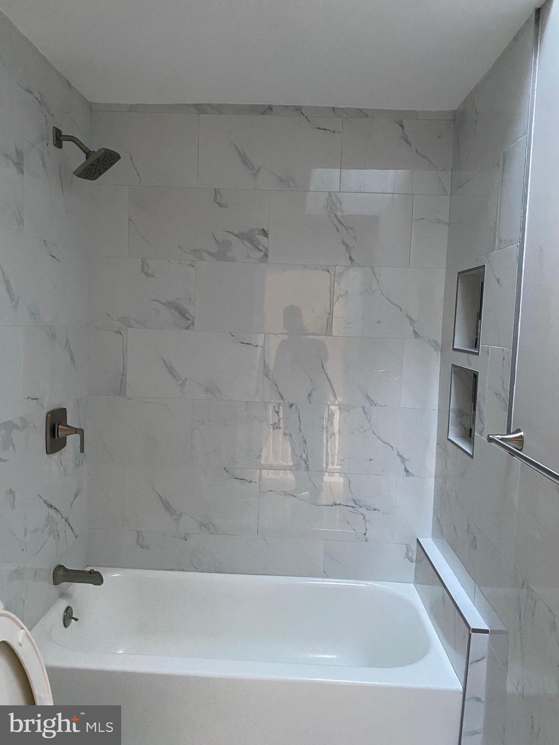 6445 Garman Street Philadelphia, PA 19142 - Photo 28 of 56 a bathroom with a bathtub