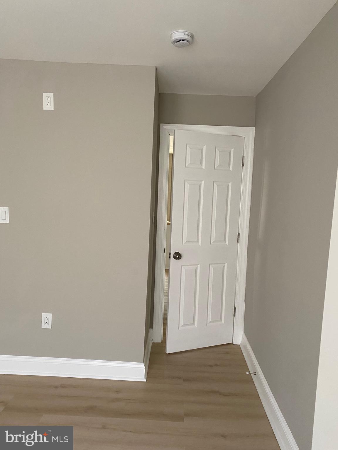 6445 Garman Street Philadelphia, PA 19142 - Photo 35 of 56 a view of an empty room with wooden floor