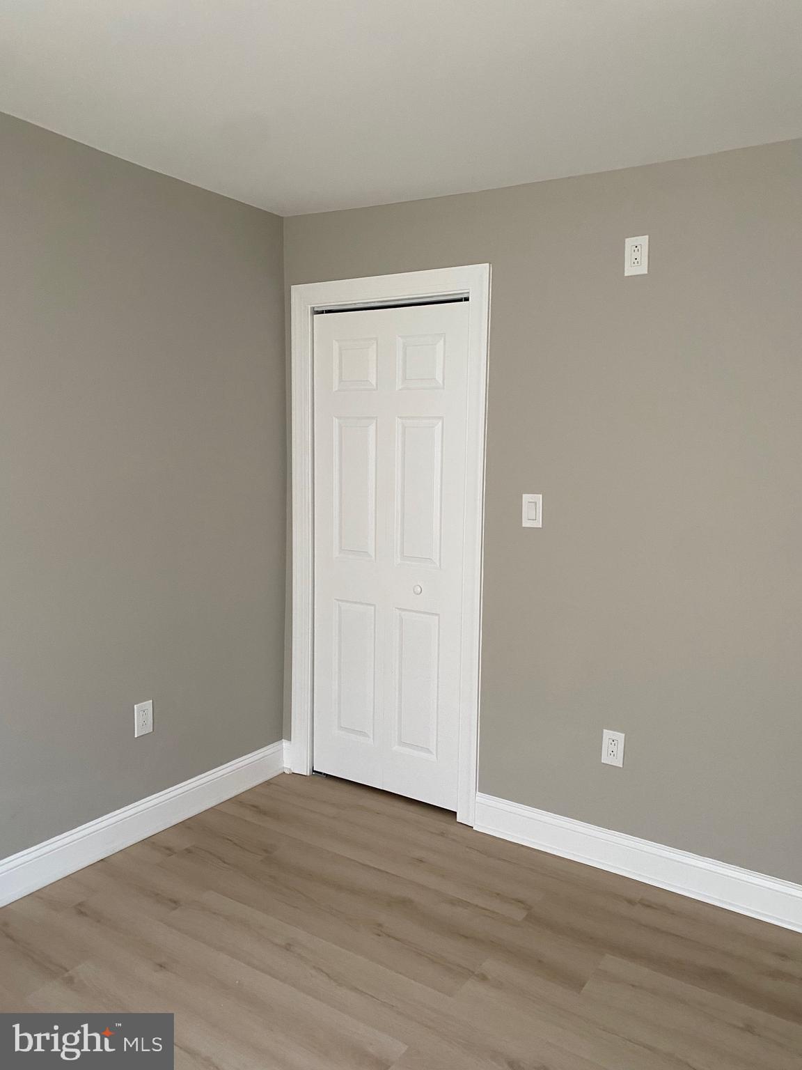 6445 Garman Street Philadelphia, PA 19142 - Photo 36 of 56 a view of an empty room with wooden floor