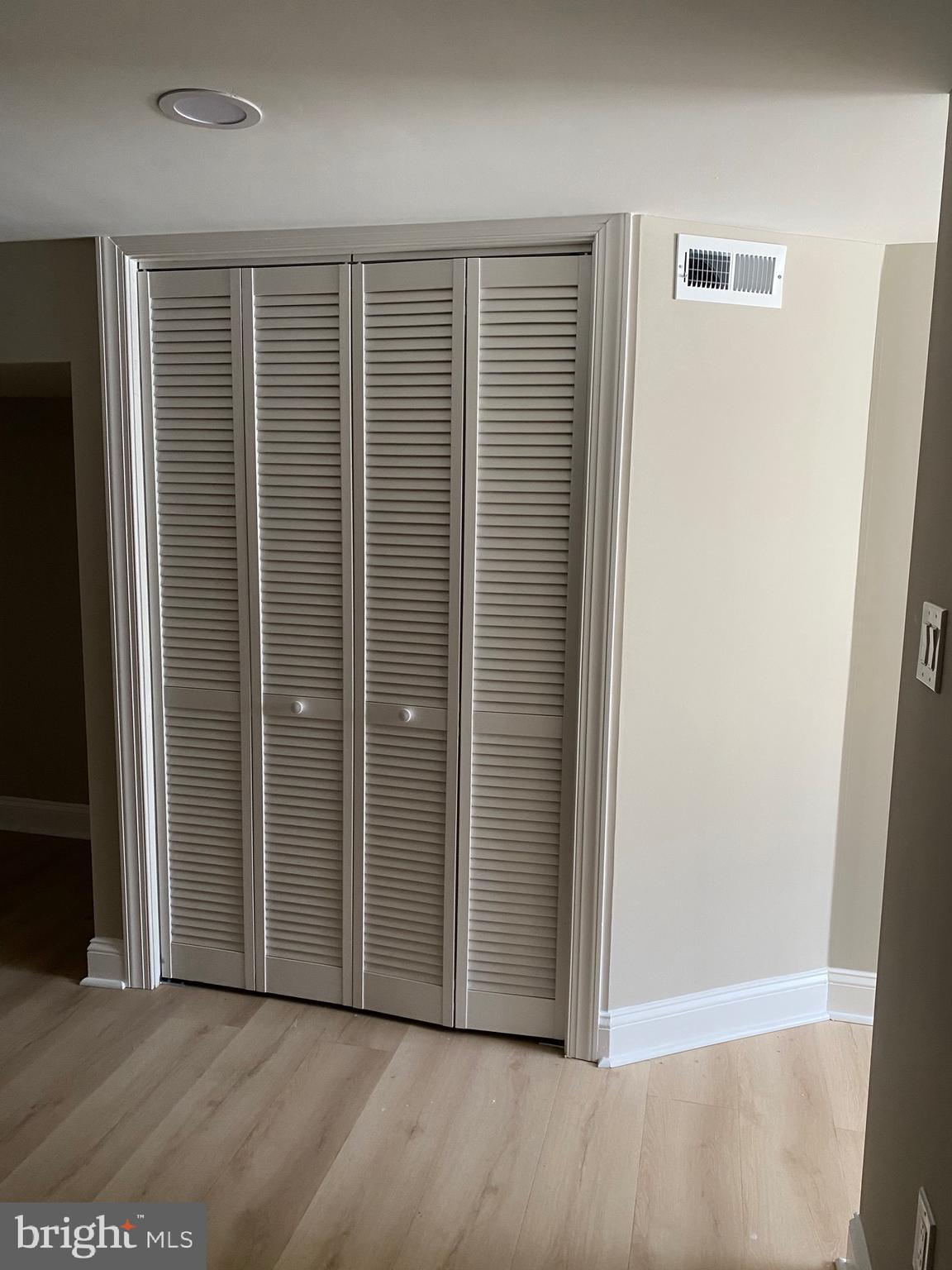 6445 Garman Street Philadelphia, PA 19142 - Photo 41 of 56 an empty room with wooden floor