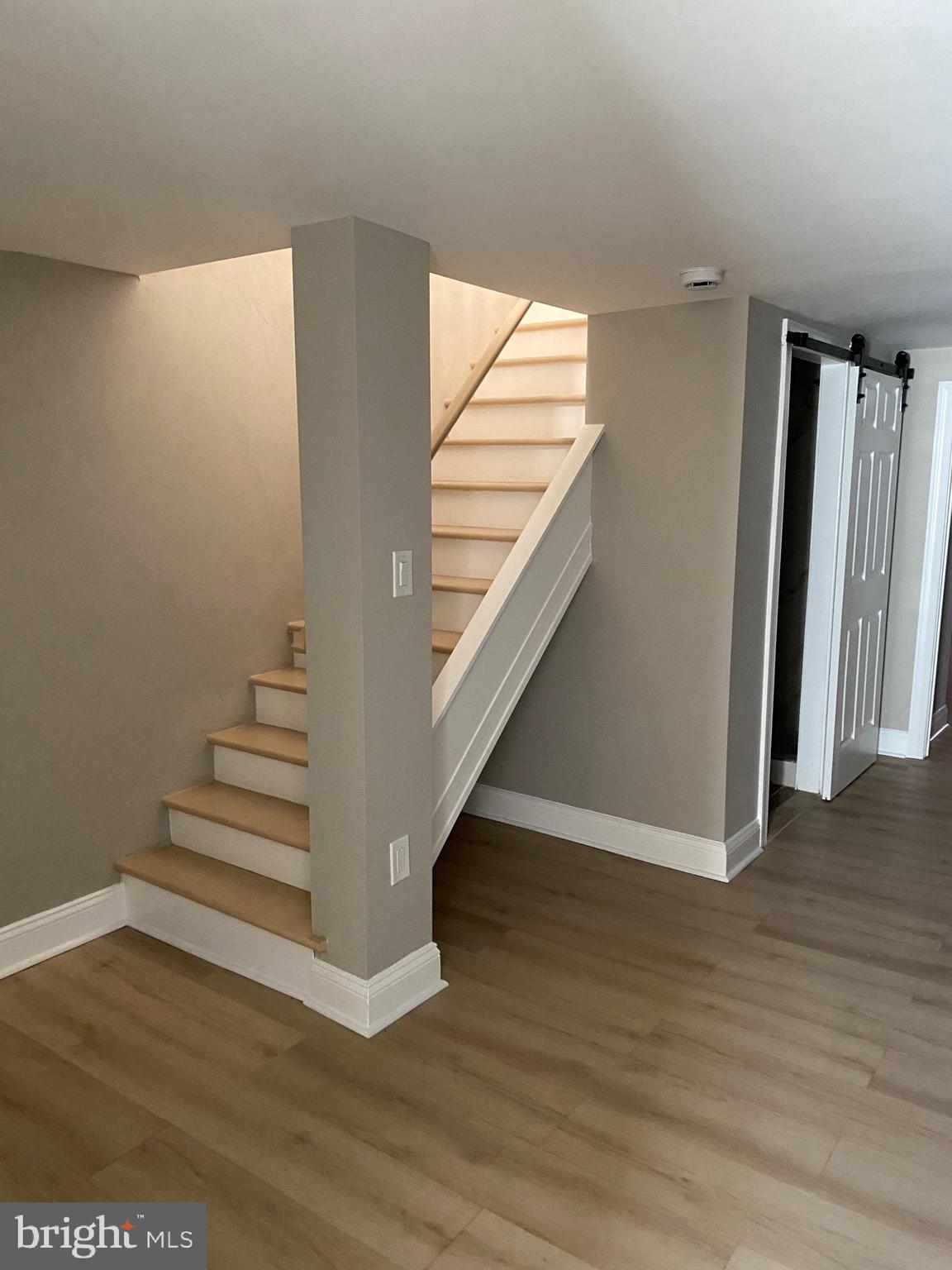 6445 Garman Street Philadelphia, PA 19142 - Photo 42 of 56 a view of entryway with wooden floor