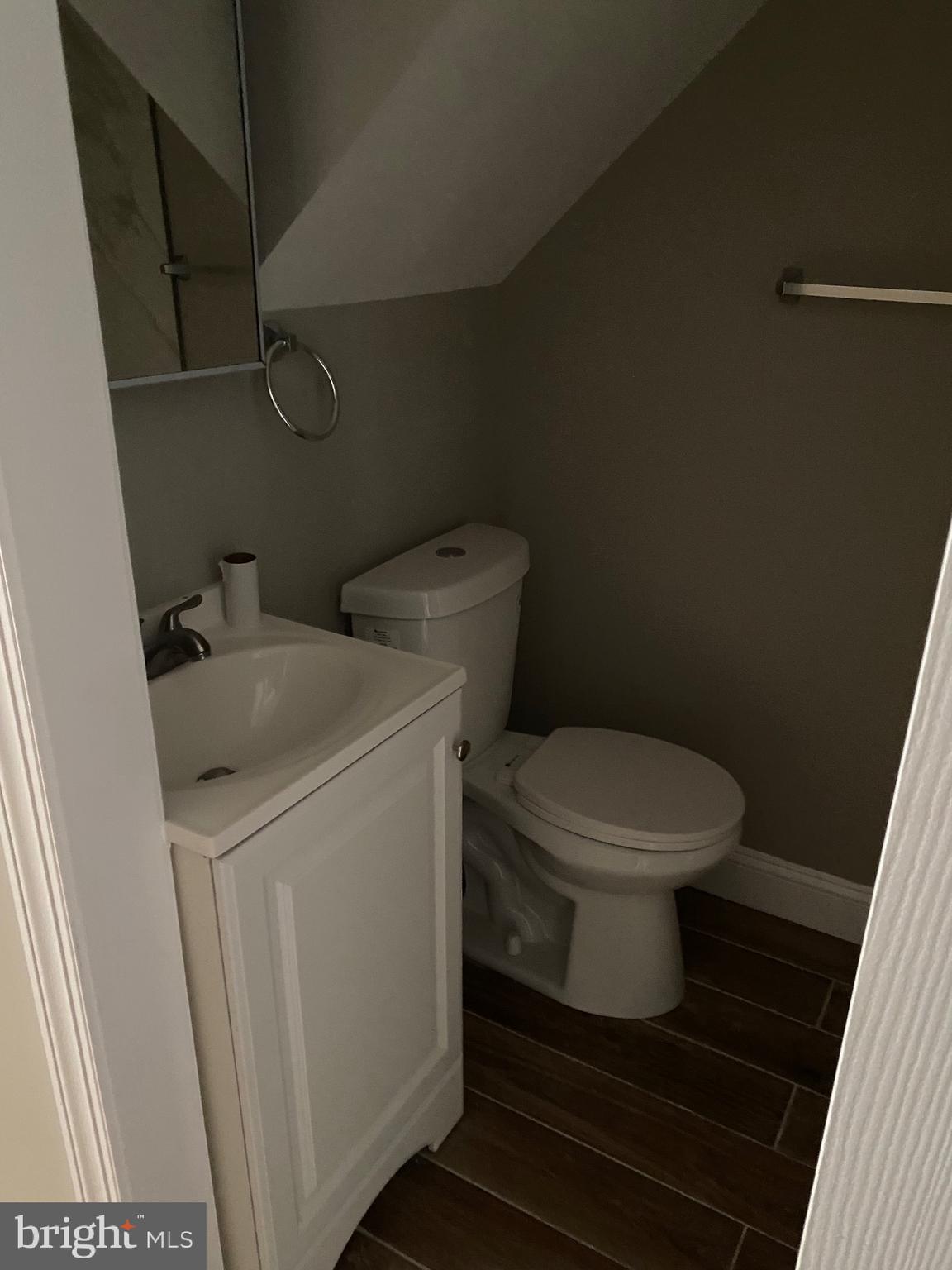 6445 Garman Street Philadelphia, PA 19142 - Photo 49 of 56 a white toilet sitting next to a white sink