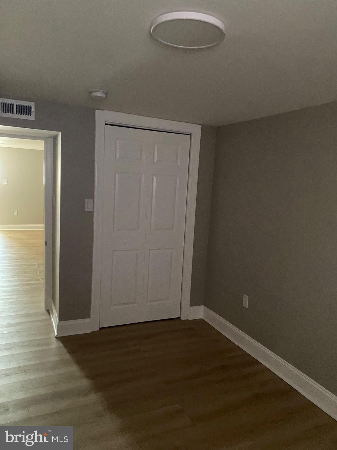 6445 Garman Street Philadelphia, PA 19142 - Photo 51 of 56 an empty room with wooden floor