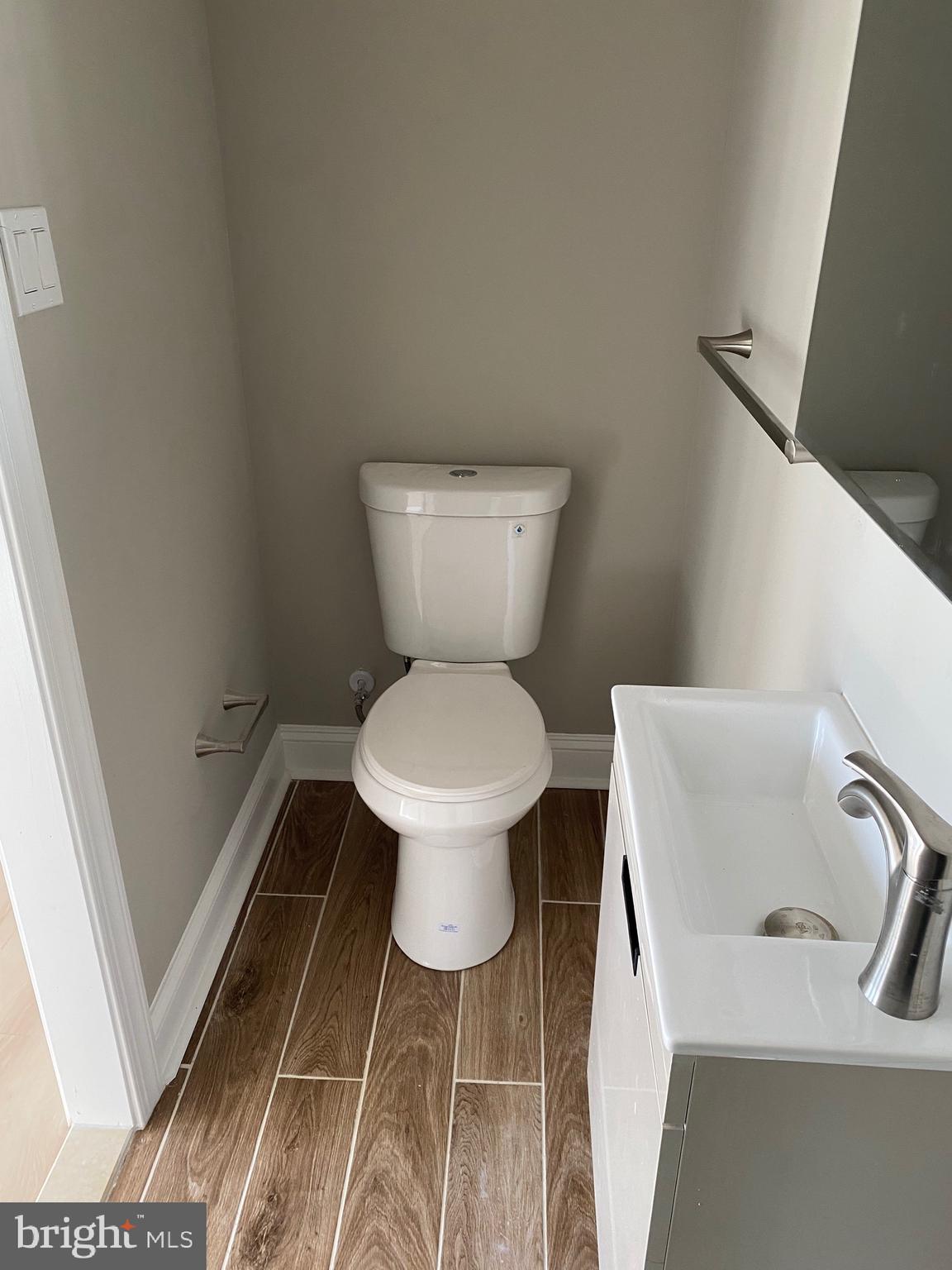 6445 Garman Street Philadelphia, PA 19142 - Photo 56 of 56 a bathroom with a sink and a toilet