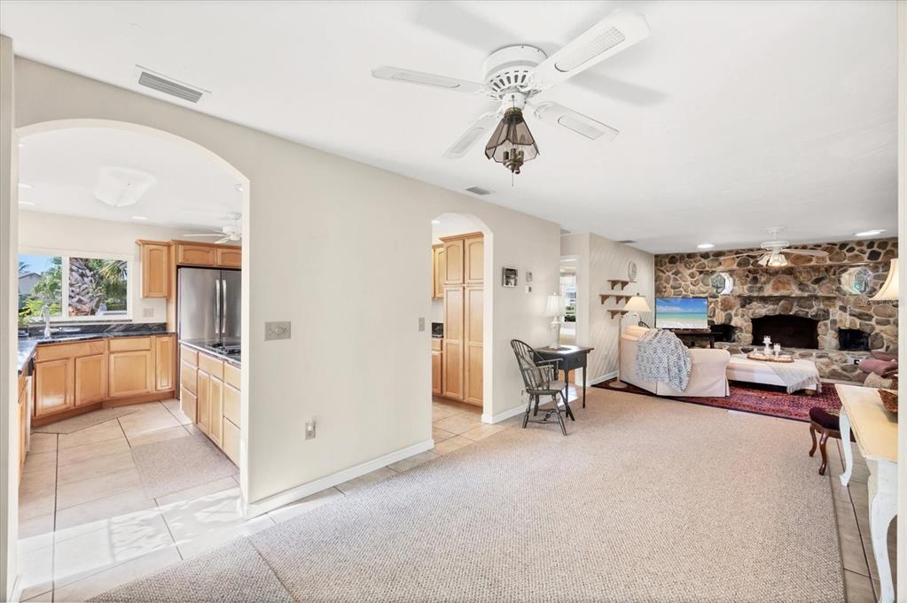 4419 Mangrove Point Road Bradenton, FL 34210 - Photo 15 of 40 a view of a livingroom with furniture and a flat screen tv