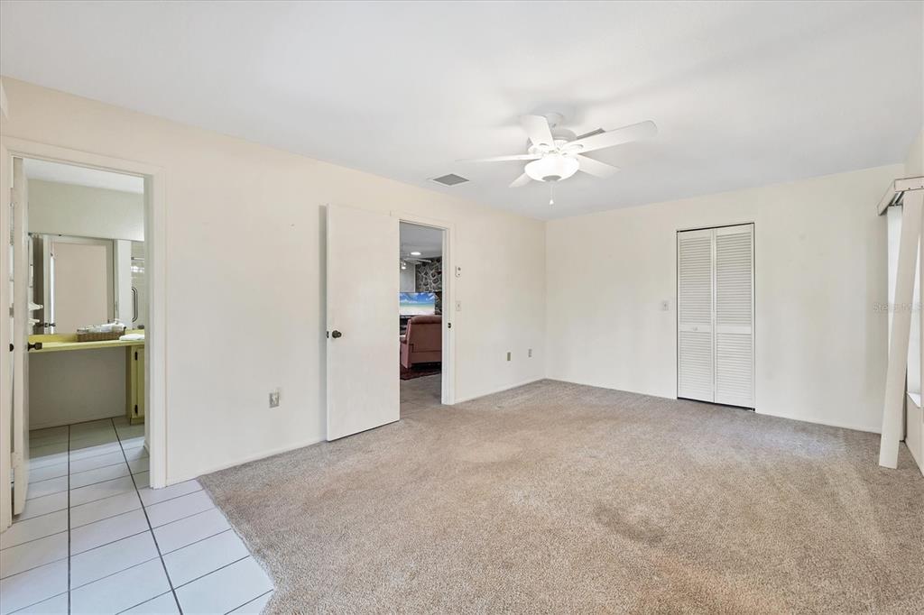 4419 Mangrove Point Road Bradenton, FL 34210 - Photo 17 of 40 a view of an empty room with a window