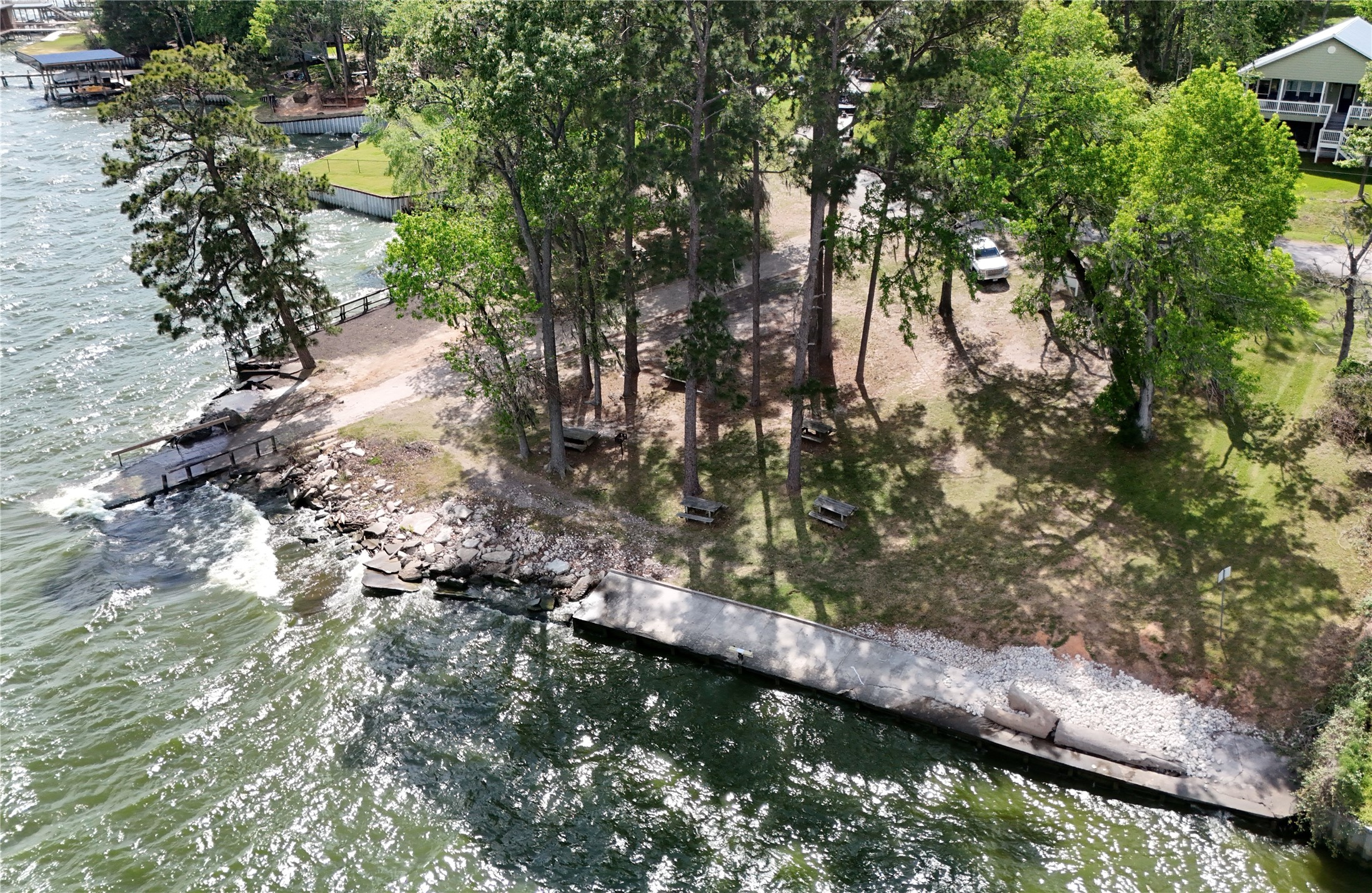 0 Walnut Lane Point Blank, TX 77364 - Photo 9 of 11 North Wood neighborhood amenities includes this picnic/park area and boat launch.