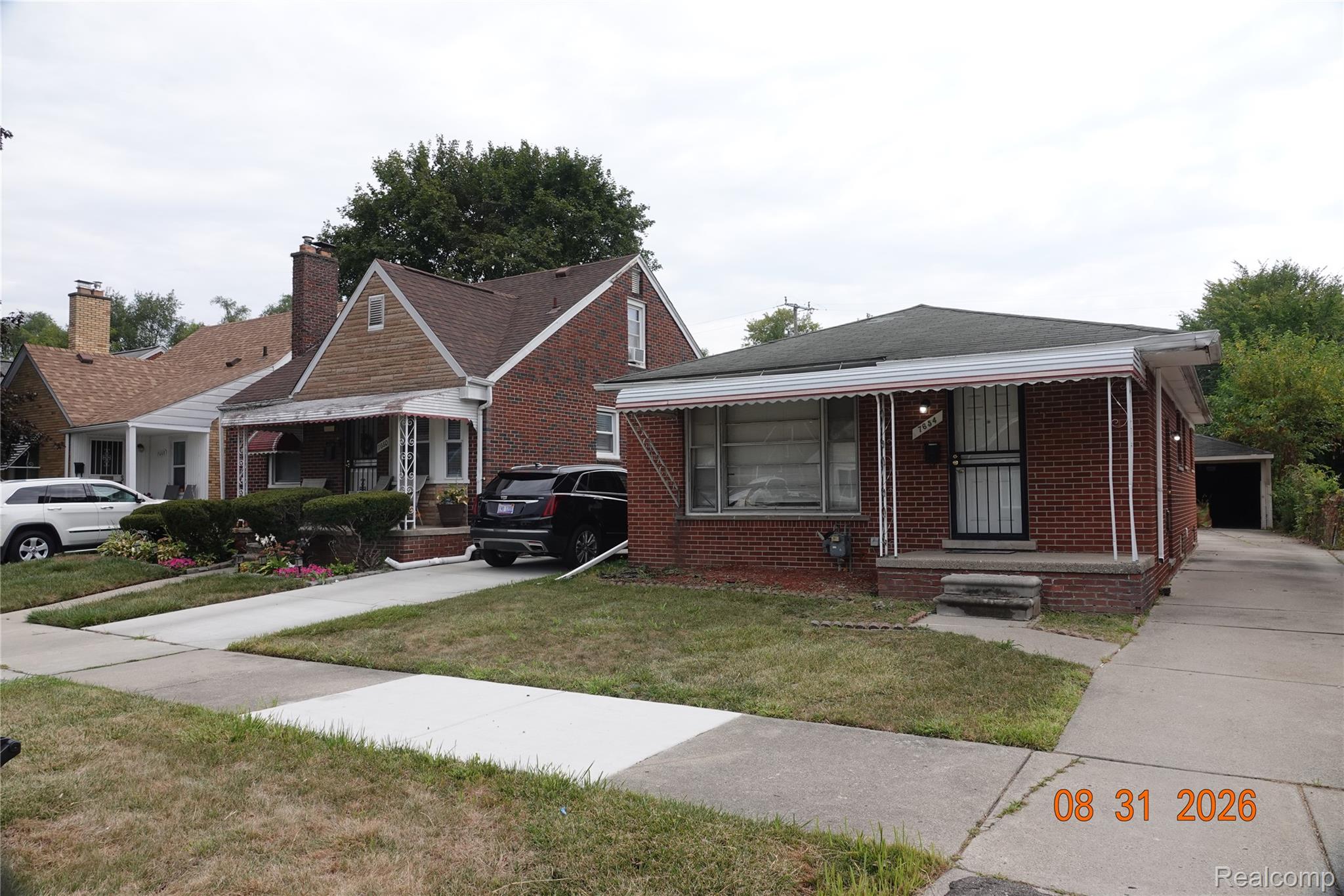 7654 Fielding Street Detroit, MI 48228 - Photo 3 of 23 Brick exterior with an awning over the front entry