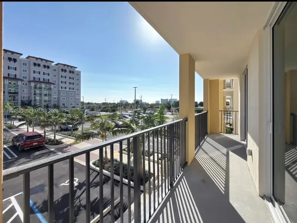 a view of balcony with furniture
