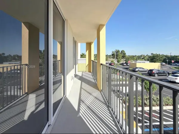 a view of a balcony with city view