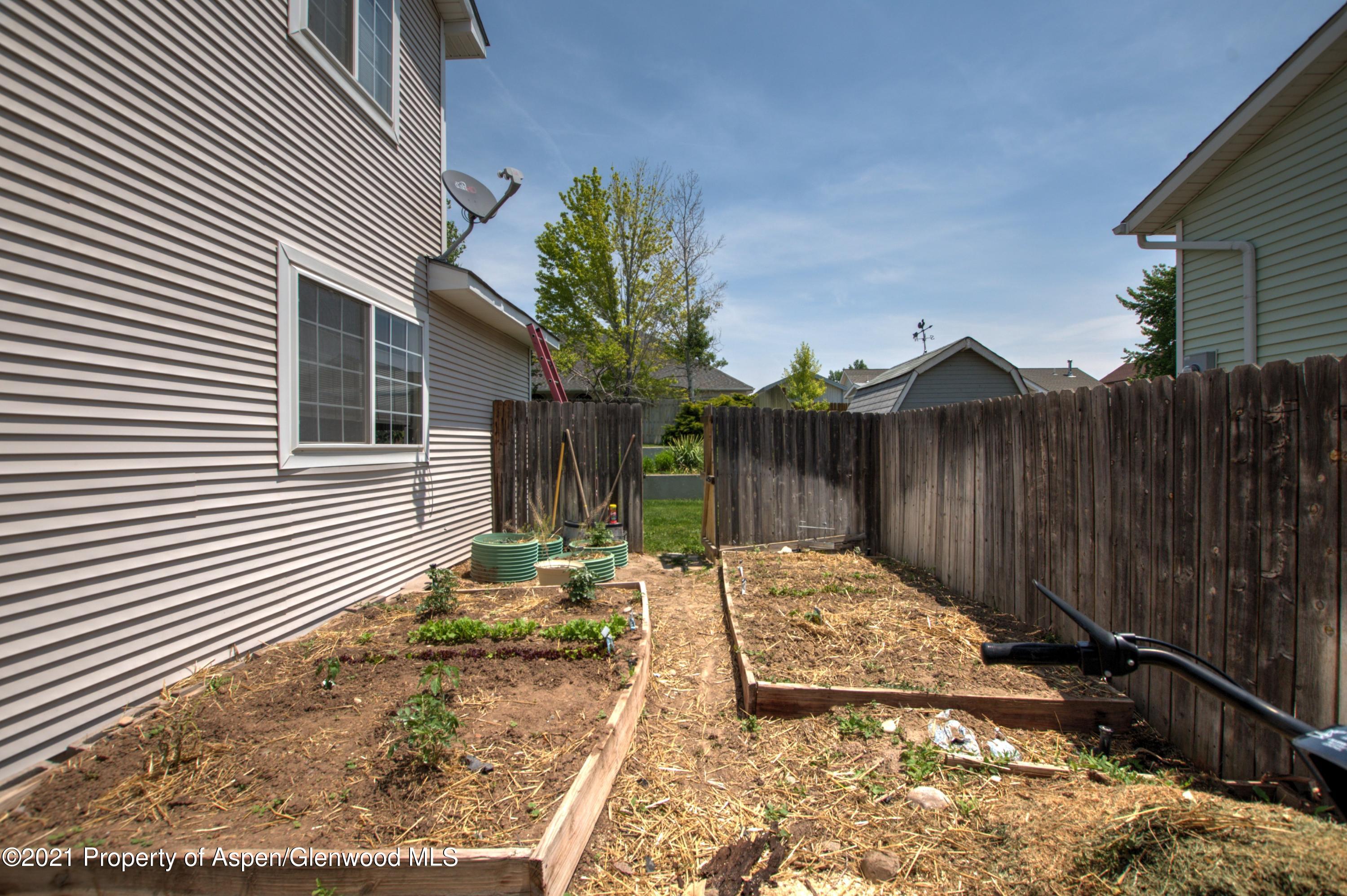 1554 East 12th Street Rifle, CO 81650 - Photo 28 of 31 a view of a backyard of the house