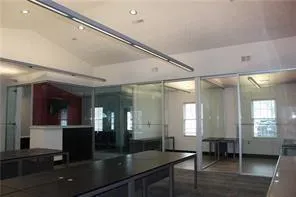 a lobby with furniture and window