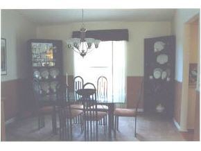 663 Southeast Raleigh Palm Bay, FL 32909 - Photo 2 of 7 a view of a dining room with balcony