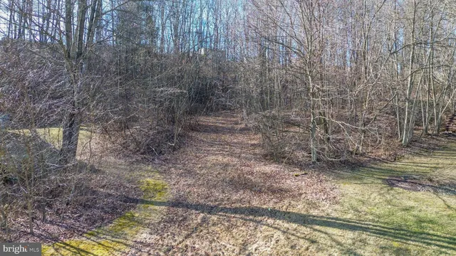 a aerial view of residential houses with outdoor space