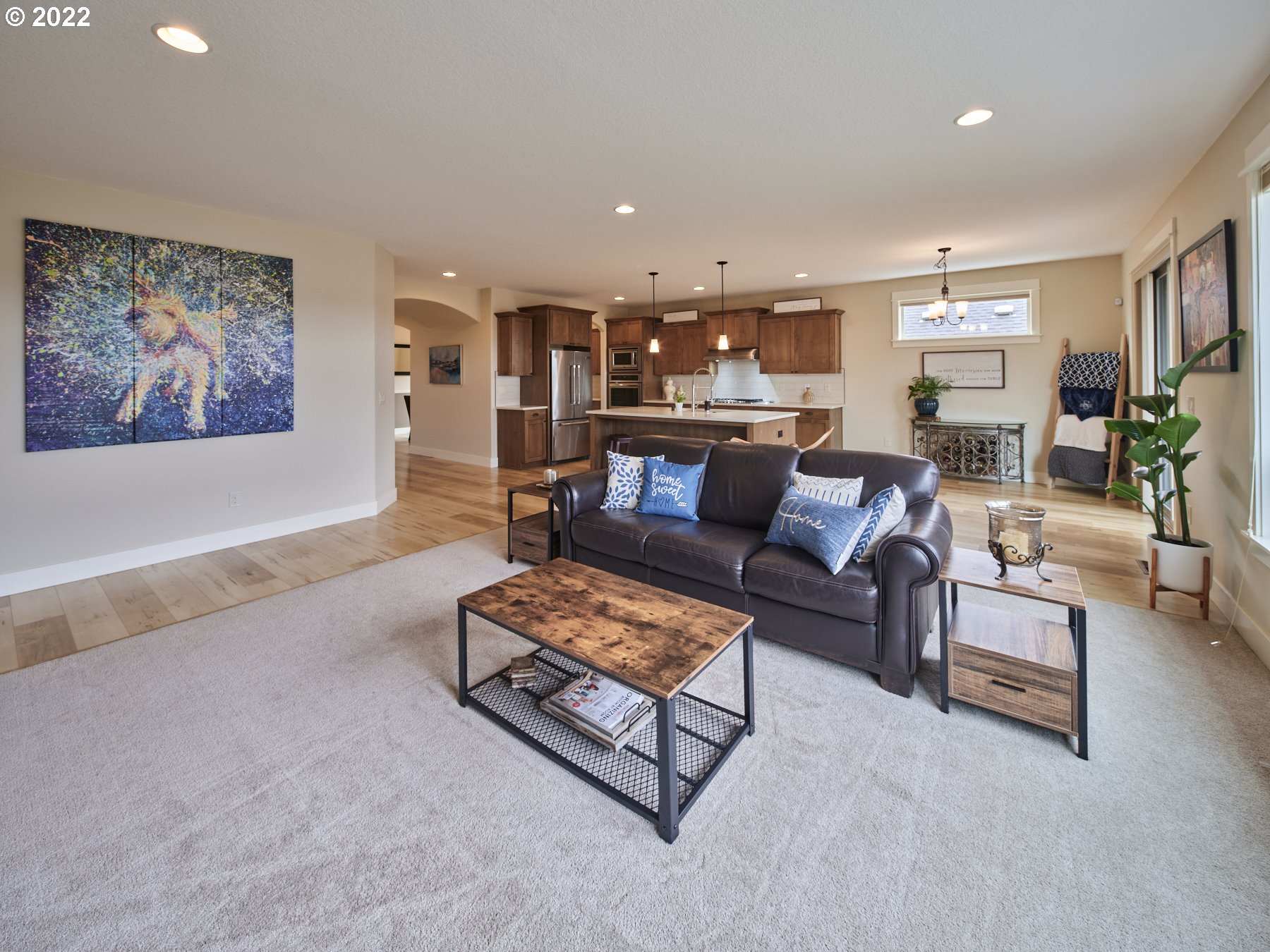 1837 South 46th Place Ridgefield, WA 98642 - Photo 8 of 32 a living room with furniture and a painting