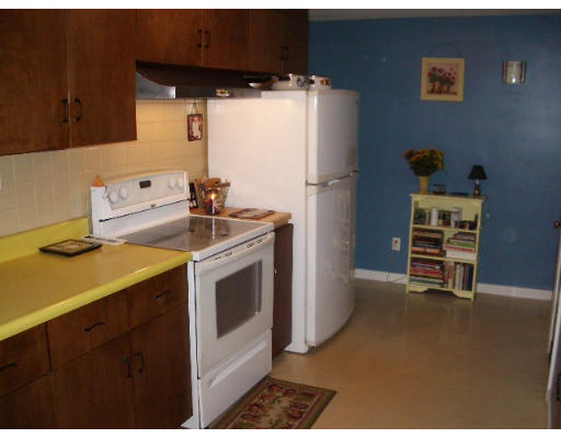 165 State Road Templeton, MA 01436 - Photo 5 of 9 a kitchen with a stove and a refrigerator