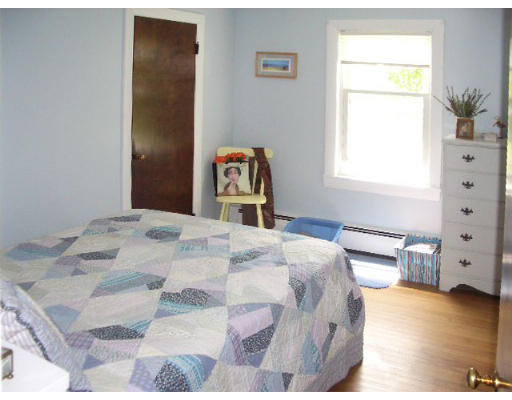 165 State Road Templeton, MA 01436 - Photo 6 of 9 a bedroom with a bed and a dresser