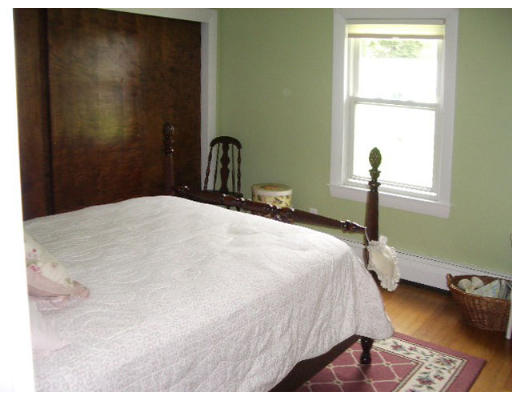 165 State Road Templeton, MA 01436 - Photo 8 of 9 a bedroom with a bed and a window