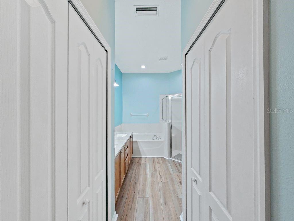 6077 Sandhill Ridge Drive Lithia, FL 33547 - Photo 24 of 58 a view of a hallway with a washer and dryer