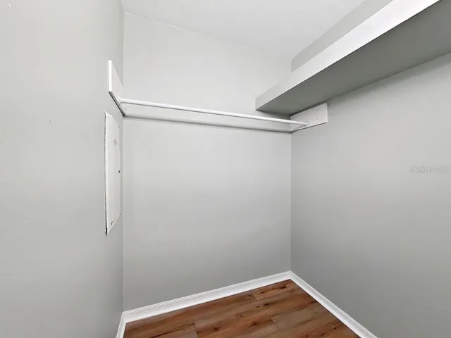 an aerial view of residential houses with outdoor space and street view