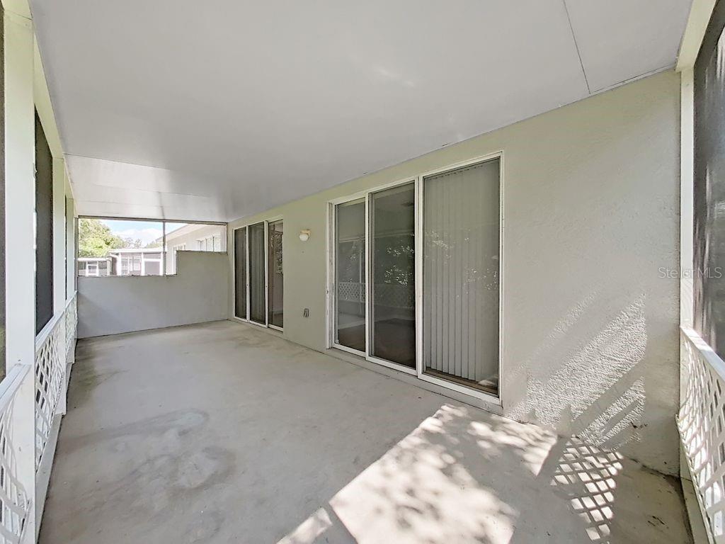 6077 Sandhill Ridge Drive Lithia, FL 33547 - Photo 40 of 58 a view of an empty room with windows