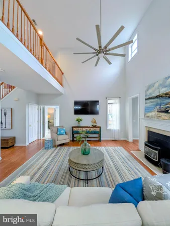 a bedroom with furniture and a fireplace