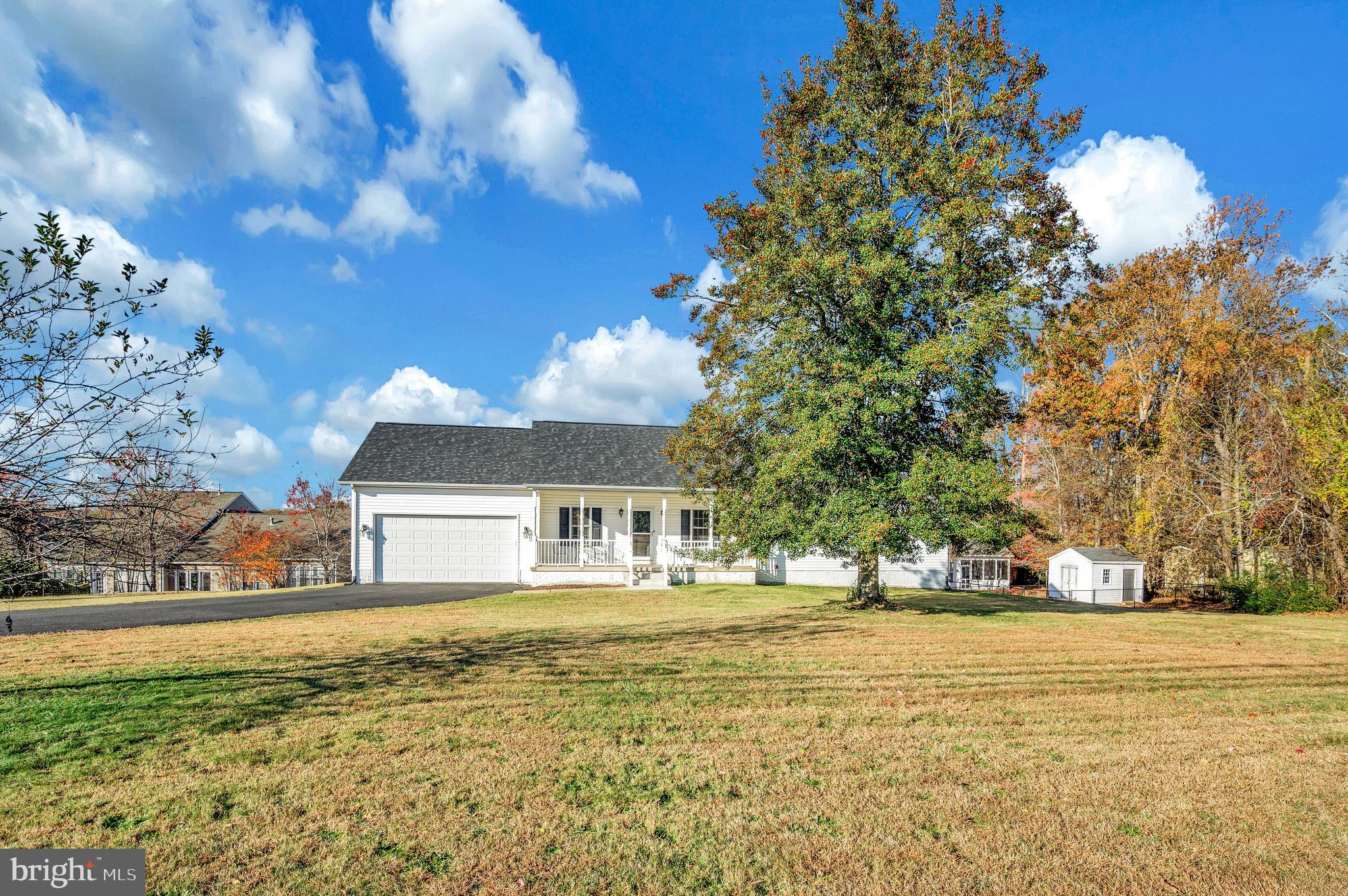 773 Truslow Road Fredericksburg, VA 22406 - Photo 2 of 63 a front view of a house with a yard