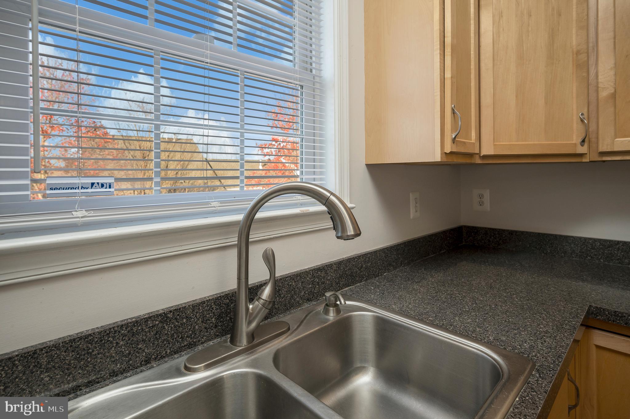 773 Truslow Road Fredericksburg, VA 22406 - Photo 32 of 63 a close view of sink and tap
