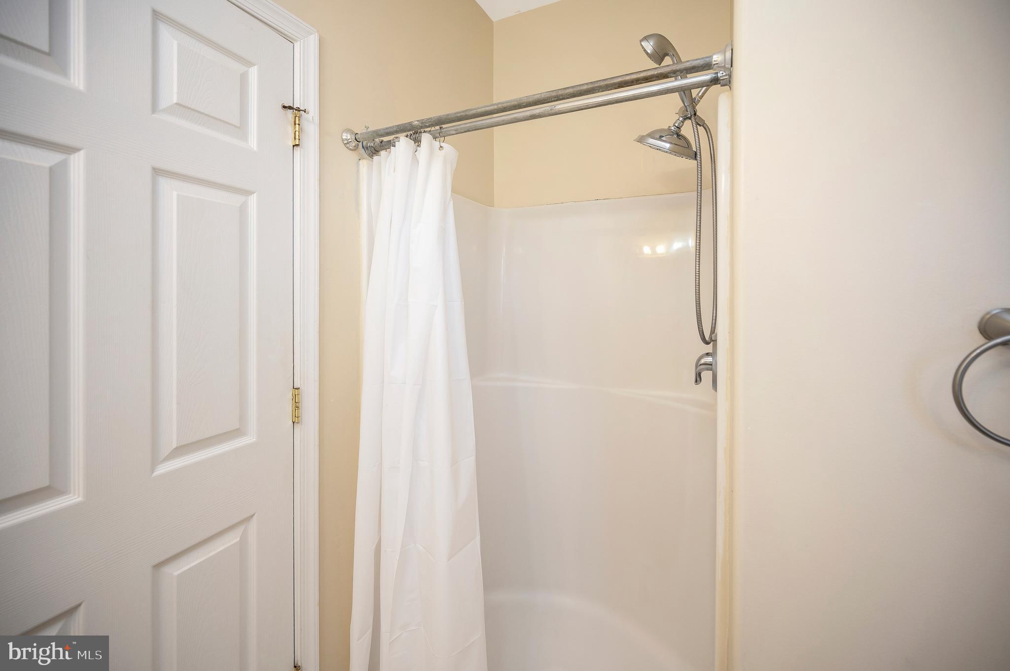 773 Truslow Road Fredericksburg, VA 22406 - Photo 46 of 63 a bathroom that has a glass shower door