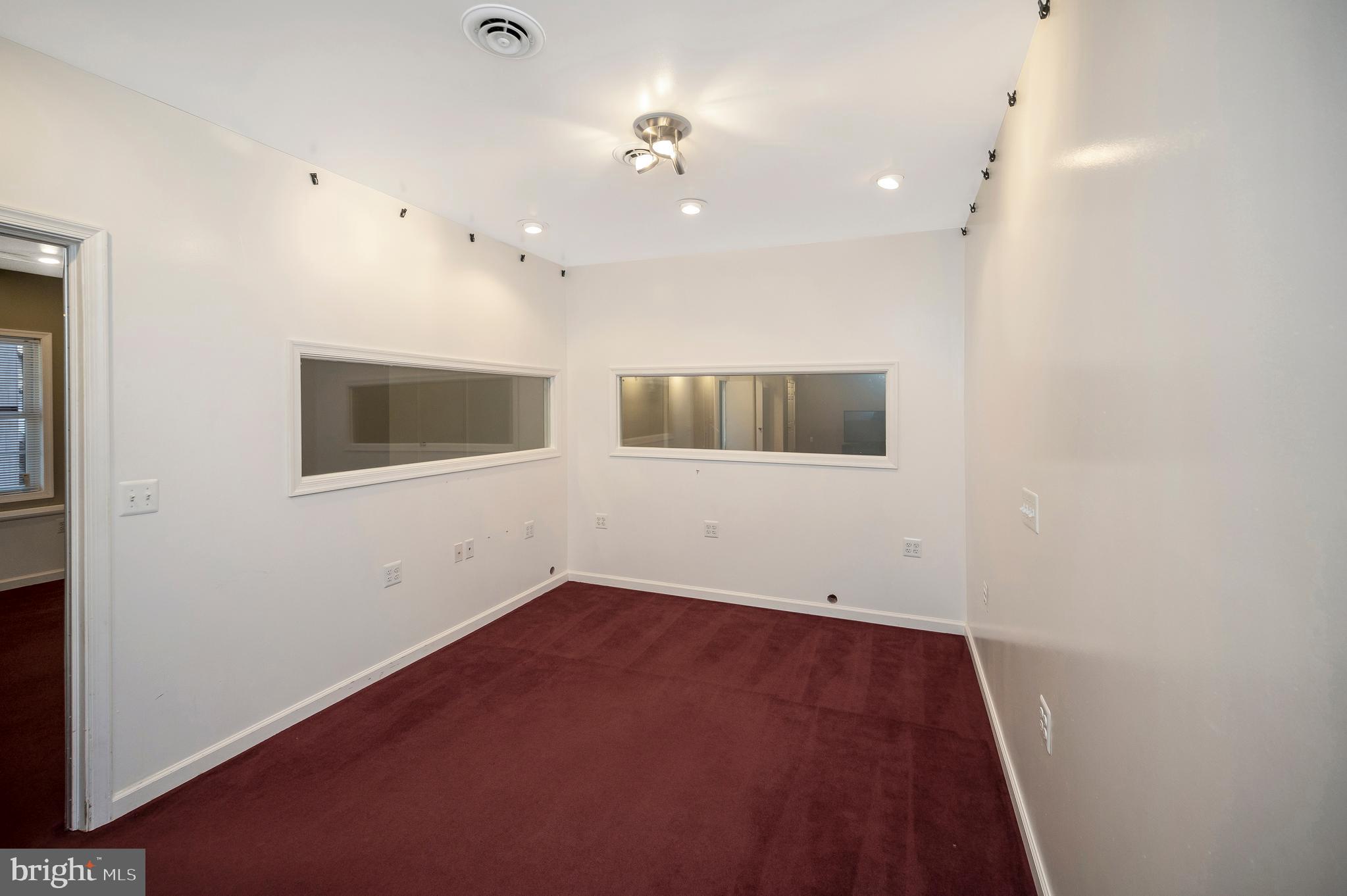 773 Truslow Road Fredericksburg, VA 22406 - Photo 55 of 63 wooden floor in an empty room with a window