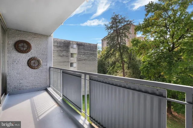 a balcony with next to a window