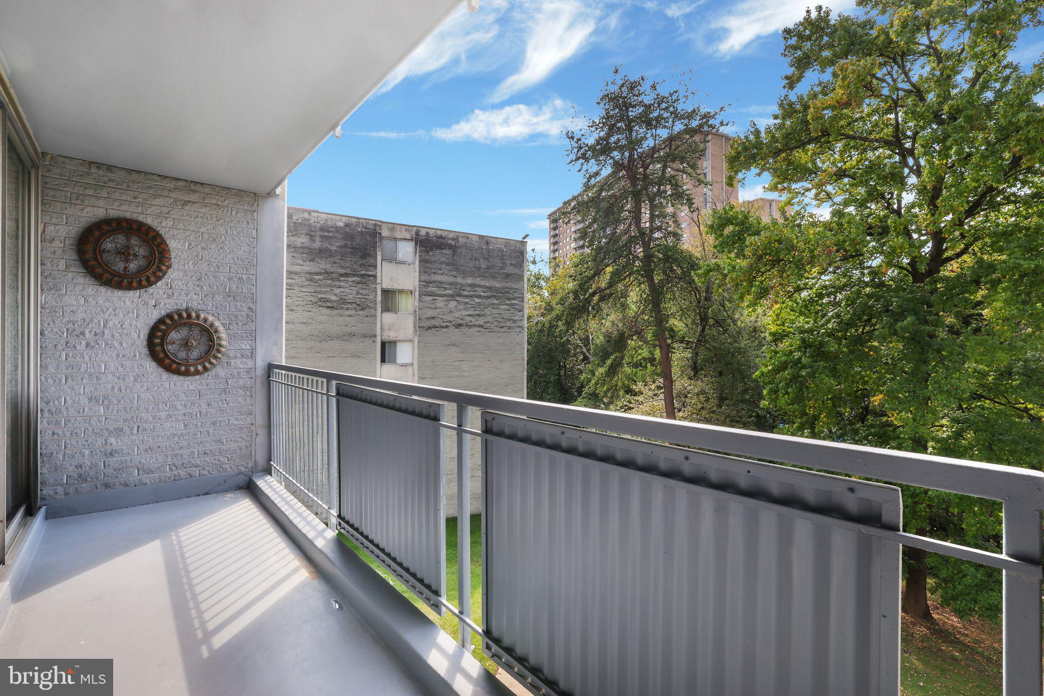 1828 Metzerott Road, Unit 202 Hyattsville, MD 20783 - Photo 2 of 18 a balcony with next to a window