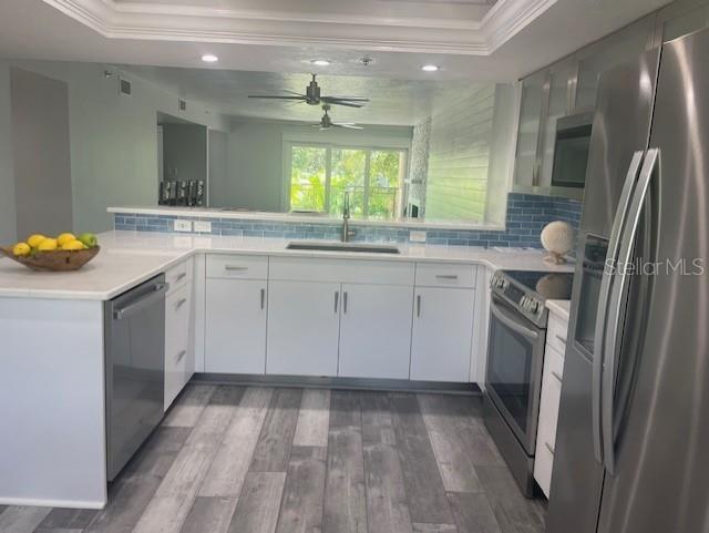 1740 Alderman Street, Unit 7 Sarasota, FL 34236 - Photo 11 of 35 a kitchen with a sink stove and refrigerator
