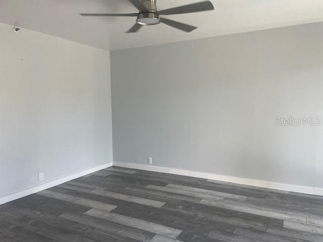 1740 Alderman Street, Unit 7 Sarasota, FL 34236 - Photo 24 of 35 a view of a room with wooden floor