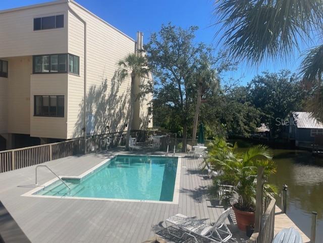 1740 Alderman Street, Unit 7 Sarasota, FL 34236 - Photo 27 of 35 a view of a swimming pool with a patio