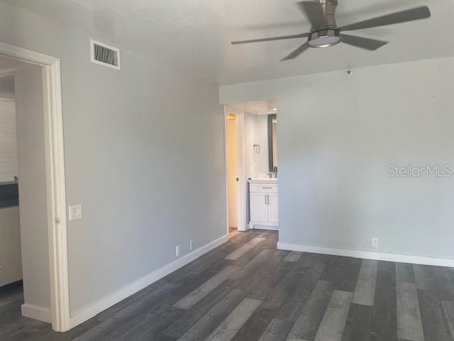 1740 Alderman Street, Unit 7 Sarasota, FL 34236 - Photo 29 of 35 a view of an empty room with wooden floor