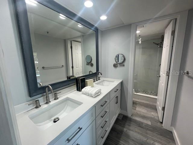 1740 Alderman Street, Unit 7 Sarasota, FL 34236 - Photo 30 of 35 a bathroom with a double vanity sink mirror and double