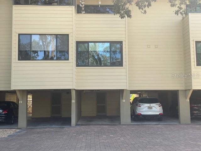 1740 Alderman Street, Unit 7 Sarasota, FL 34236 - Photo 3 of 35 a front view of a house with parking space