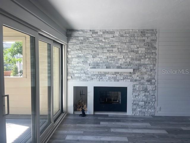 1740 Alderman Street, Unit 7 Sarasota, FL 34236 - Photo 8 of 35 a room with a fireplace