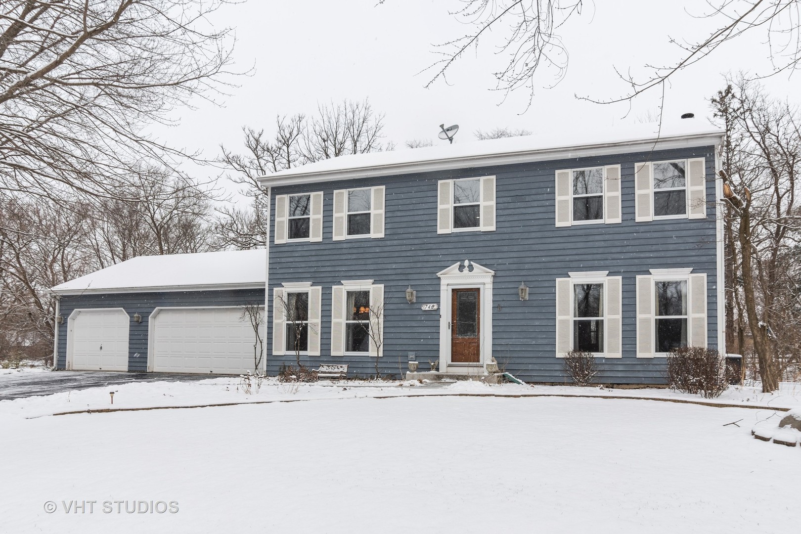 31W740 Russell Road Wayne, IL 60184 - Photo 1 of 20 front view of a house with a dry trees