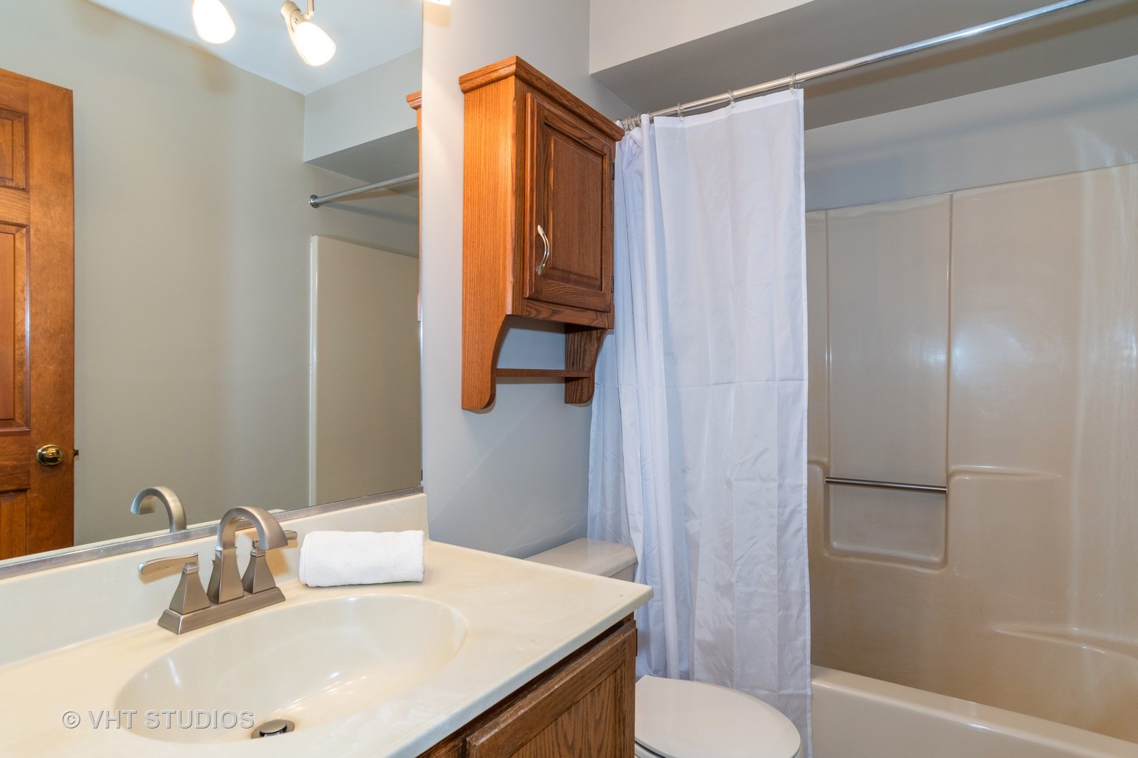 31W740 Russell Road Wayne, IL 60184 - Photo 11 of 20 a bathroom with a sink toilet and shower