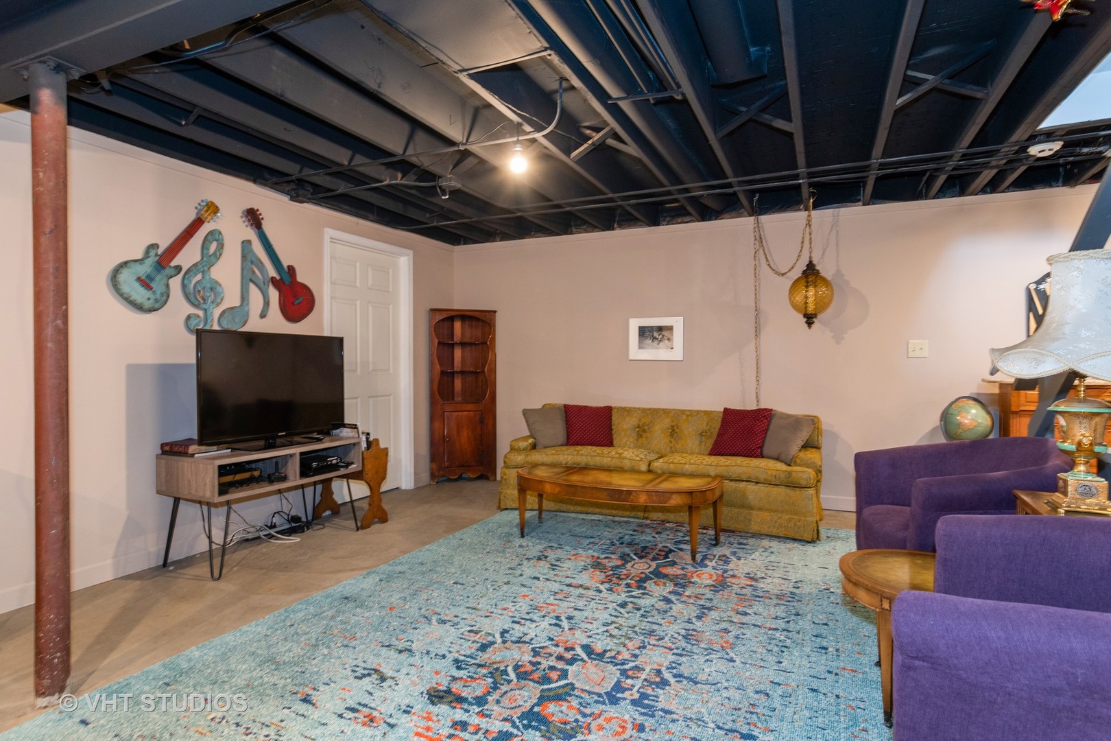 31W740 Russell Road Wayne, IL 60184 - Photo 13 of 20 a living room with furniture and a flat screen tv