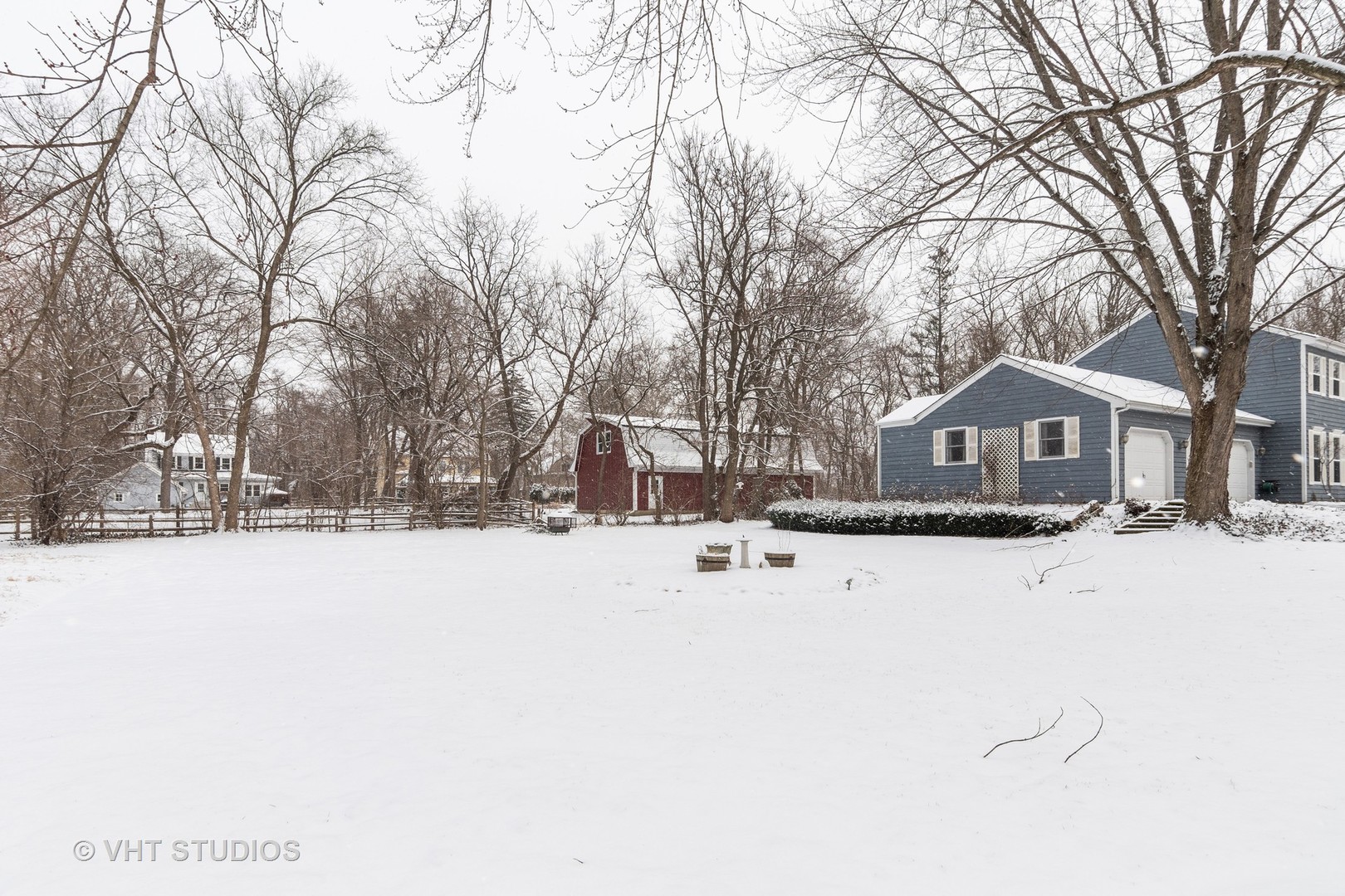 31W740 Russell Road Wayne, IL 60184 - Photo 15 of 20 a wooden bench sitting in middle of snow