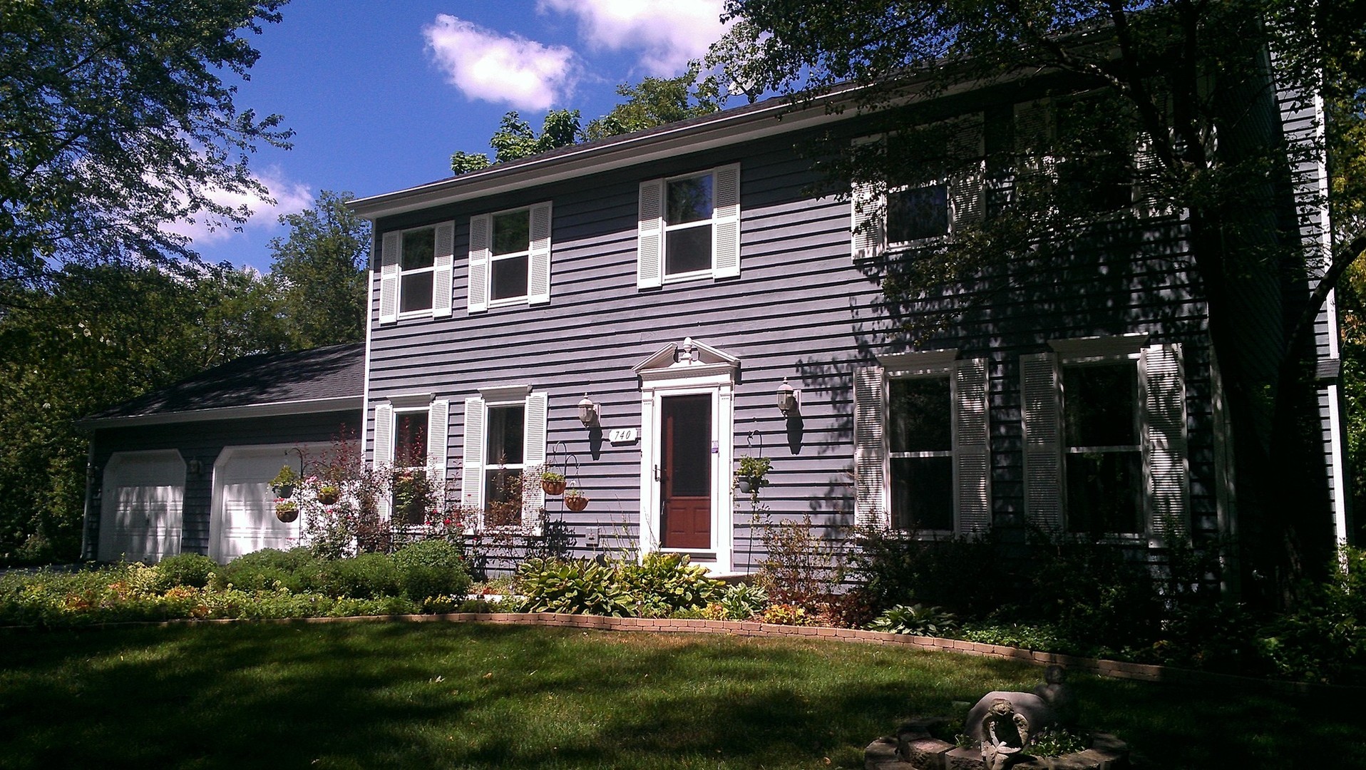 31W740 Russell Road Wayne, IL 60184 - Photo 17 of 20 a front view of a house with a yard