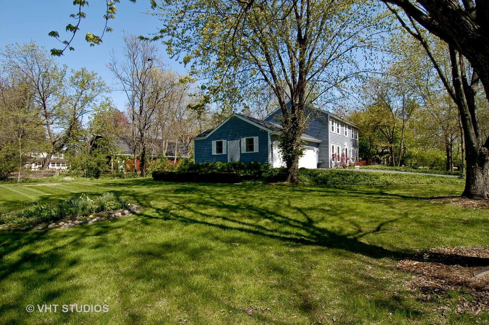 31W740 Russell Road Wayne, IL 60184 - Photo 19 of 20 a front view of a house with a yard