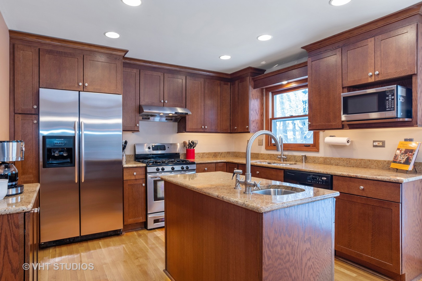 31W740 Russell Road Wayne, IL 60184 - Photo 3 of 20 a kitchen with granite countertop a sink stove and refrigerator
