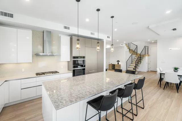 a view of entryway with wooden floor