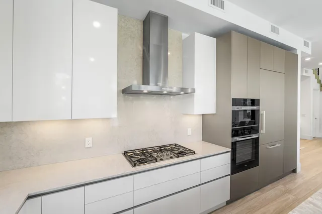 a view of balcony with wooden floor