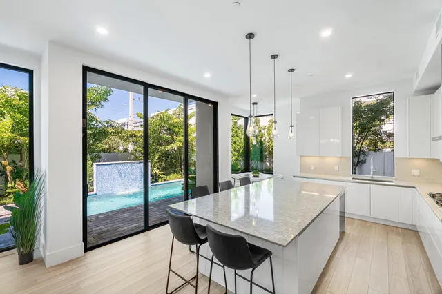a view of a backyard with a small pool